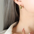 U-shaped gold plated twist earrings with sparkling green zircon stones for women - Small / Gold with Green Zircon