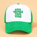 Detailed front view of green and white mesh trucker hat with Good Things Take Time slogan - Green