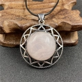 Silver hexagram necklace featuring a large round pink crystal on a black cord - Rose Quartz