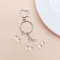 Close-up of cute transparent pink cherry charms with silver heart-shaped keyring - Clear Cherry (With Keychain)