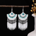 Bohemian fan-shaped tassel earrings with silver finish and turquoise feather charms - Cyan