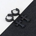 Detail of gothic cross charms on black titanium steel hoop earrings with textured finish - Four-Pointed Star - Black