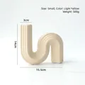 Modern minimalist light yellow U-shaped ceramic vase with elegant vertical stripes - S-Shaped Vase-Small / Light Yellow