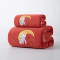 Detailed view of soft coral fleece towels featuring cute embroidered rabbit on moon design - Sleeping Rabbit Wine Red