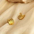 Polished 18K gold plated stainless steel croissant dome stud earrings on silk background - Ribbed Croissant Shape