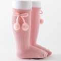 Pink knee-high baby socks with vertical knit stripes, cute bow, and pompom details - Pink