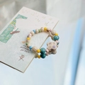 Colorful ceramic bead bracelet with flower pendant on illustrative card - Four-Leaf Clover (938B四叶草)