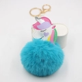 Colorful unicorn pompom keychain with blue plush fur ball and golden metal clasp - Lake Blue