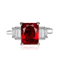 Luxury emerald-cut pink zircon ring with shimmering side stones on polished silver band - Adjustable Open / Red Zirconia
