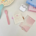 Detail of cream quilted small organizer pouch with heart texture and pink heart button - Heart Milk White