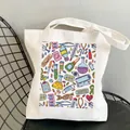 White canvas tote bag featuring colorful medical nurse themed print illustrations - Style C5 (No Inner Pocket/No Zipper)