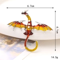 Detail view of the colorful dragon brooch showing 6.7cm width and 6.1cm height dimensions - Yellow (Wyvern)