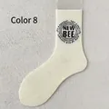 Men's cream cotton crew socks with vintage black circular logo and ribbed cuffs - One Size / Retro Letter Style 8 (New Bee)