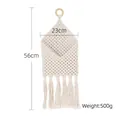 Bohemian off-white handmade woven wall hanging storage net with tassels and wood ring - 23*56cm