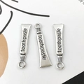 Drei silberfarbene Anhänger in Zahnpasta-Form für DIY-Halsketten und Schmuckherstellung - Zahnpasta (5x27mm)