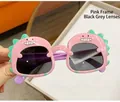 Lunettes de soleil dinosaure rose pour enfant avec verres gris et branches violettes - Rose