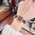 Luxury gold square watch with deep red dial and red leather strap on wrist - Gold/Deep Red (Square Roman Numerals Bezel)
