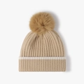 Beige thick knitted winter beanie with faux fur pompom and white striped cuff detail - Camel
