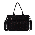 Black corduroy shoulder bag featuring red strawberry patterns and adjustable straps - Black Strawberry