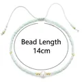 Handmade mint green beaded bracelet with a white pearl and adjustable cord, 14cm bead length - Mint Green