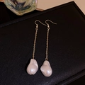 Elegant French vintage gold drop earrings featuring baroque pearls on a black background - Irregular Pearl Snake Bone Chain Tassel (Earring Hook)