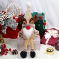 Reindeer themed Christmas gnome plush with brown antlers and sequin hat on gift box - Elk Style