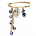 Golden safety pin brooch with blue evil eye charms, natural shell, and faceted bead pendant - Pin with Eye Bead Chain, Shell Charm, and Faceted Bead