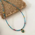 Colorful beaded necklace featuring heart turquoise pendant and gold-tone bead design - Turquoise Necklace XL0369