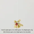 Christmas decoration featuring golden iron bells with red berries and a festive gold bow - Double Bell E