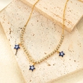 Golden tennis chain necklace with blue star charms and evil eye detail for women - Gold Evil Eye Stars