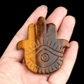 Natural tiger eye stone Hamsa Hand pendant with hand-carved eye pattern and silk luster - Tiger's Eye