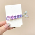 Sparkling mermaid tail hair clip with purple crystals on a golden metal base - Purple