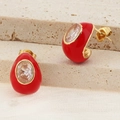 Elegant gold earrings featuring red enamel finish and oval clear cubic zirconia stones - Gold Red Drip Oil Zirconia Style (KE114328-SP)