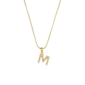 Golden snake chain necklace featuring a minimalist pearl-studded letter M pendant - Letter M