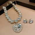 Elegant gold heart pendant necklace and earring set with shimmering round crystals - Necklace Earring 2-Piece Set / Gold
