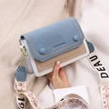 Blue and cream structured crossbody bag with wide patterned shoulder strap and magnetic closure - Blue