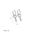 Detail view of silver key-shaped earrings with hexagonal head and white glossy inlay - Silver Key Style (A0216I-Silver Key)