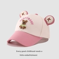 Detail of a pink and beige baseball cap featuring a cute 3D teddy bear and embroidery - 48-52cm / White/Pink Patchwork