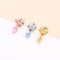 Macro shot of heart-shaped zircon planet pendants in rose gold, silver, and gold finishes - 8# (Planet)