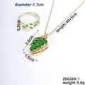 Detail der Maße des blattförmigen Schmucksets mit grünen Edelsteinen in Goldoptik - Gold Grüner Zirkonia