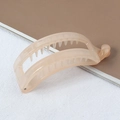 Champagne matte banana hair clip for ponytail on aesthetic fabric background - Beige