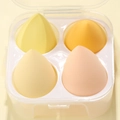 Set de 4 esponjas de maquillaje en forma de gota con caja de almacenamiento transparente - 4 Unidades Caja Serie Amarilla