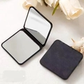Mini foldable black portable makeup mirror with double-sided HD glass on light surface - Black