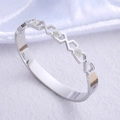 Brazalete hexagonal plateado con diamantes de imitación en acero inoxidable pulido - Diámetro interior 50x60mm/Ancho 8mm / Color Acero