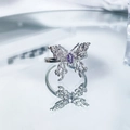 Detailed macro shot of a butterfly ring featuring a purple gemstone on a silver open band - Butterfly Style (No. 3 Open Ring)