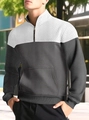 Detail of men's quarter-zip sweatshirt featuring diamond quilted texture and contrast panels - S / Tops / White + Grey