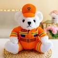 Adorable white plush teddy bear dressed in a bright orange firefighter uniform and cap - Firefighter Bear - White