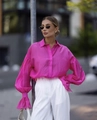 Street style shot of a bright fuchsia long-sleeved shirt with elegant puff sleeves - S / Rose Red