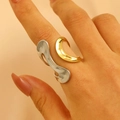Detail of two-tone 18K gold and silver wavy irregular open ring on model hand - 18K Gold Streamlined Patchwork (2641)