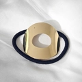 Minimalist golden U-shaped hair tie with wavy metal finish on white texture - Gold Hollow Oval